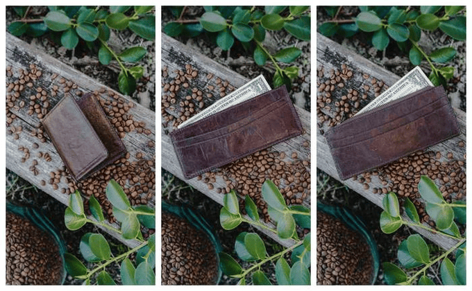 a wallet sitting on top of a pile of coffee beans